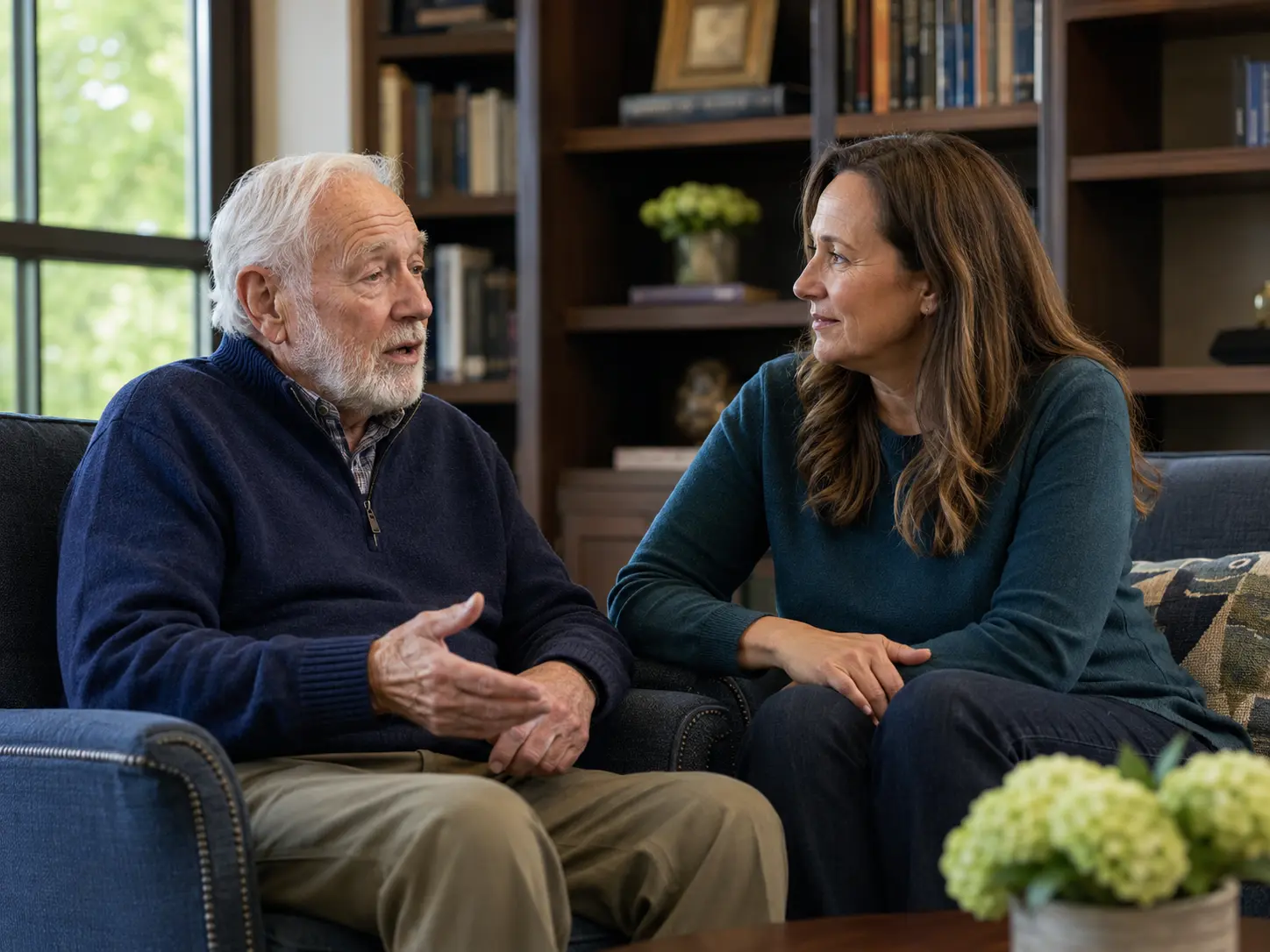 Older resident sharing his experience with an adult family member